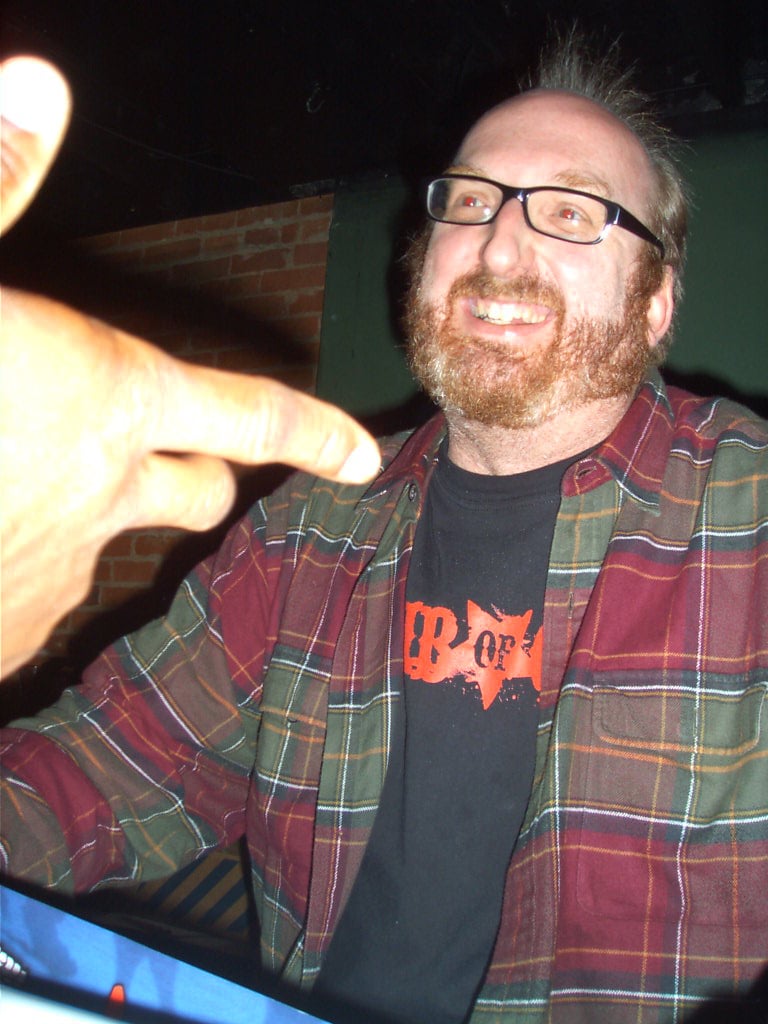 Brian Posehn dragging a mattress