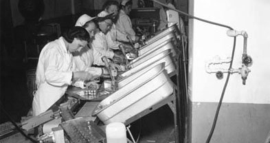 On the Tunies production line (undated photo).

San Diego businessman C. Arnholt Smith bought some local canneries in 1948. In a 1992 interview, he told the Reader: "One guy who worked for us got the bright idea of making hot dogs out of tuna for the Catholic trade. They were called Tunies. They tasted and looked just exactly like a hot dog. Actually tasted better than a hot dog, I think. The poor guy worked his brains out perfecting that. They were in the store, but they just didn't seem to take over."

You can purchase this photo at the San Diego Historical Society Research Library or online at www.sandiegohistory.org. For more information call 619-232-6203, x127. 