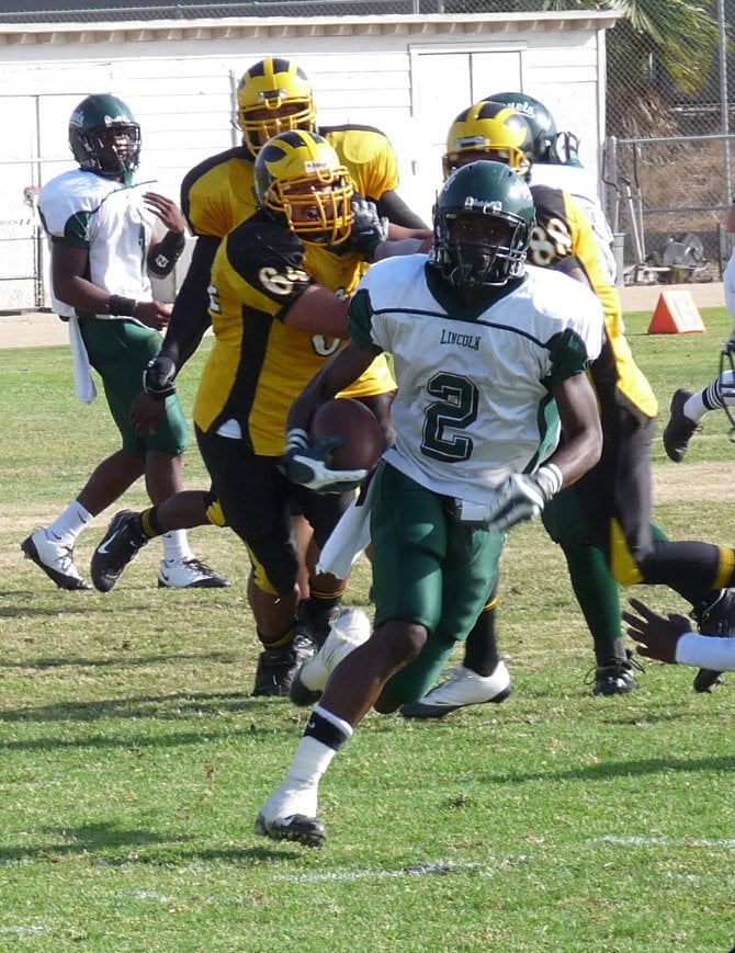 Lincoln running back Davon Dunn finds the open field