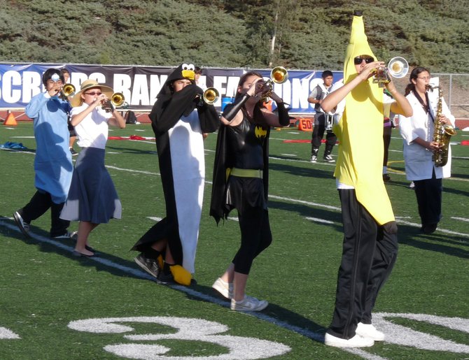 Members of the Scripps Ranch marching band dressed up for Halloween