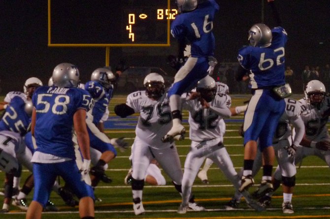 Eastlake's George Zhebroilov (16) elevates to try and block a Helix field goal attempt in the first quarter