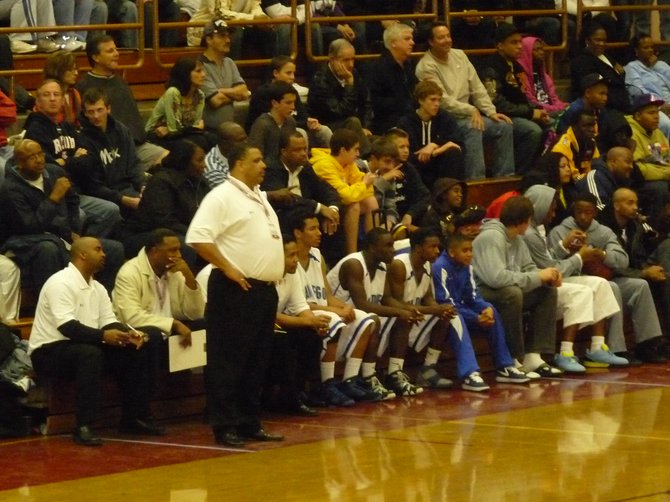 San Diego head coach Kenny Roy and the Cavers bench
