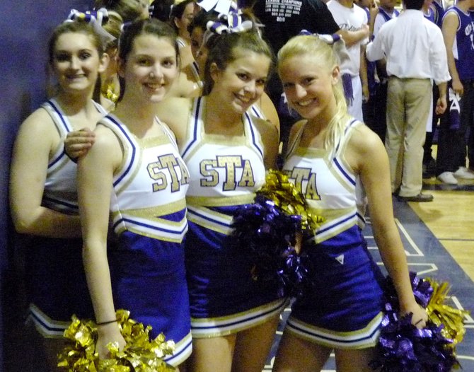 St. Augustine cheerleaders take a minute to smile for the camera