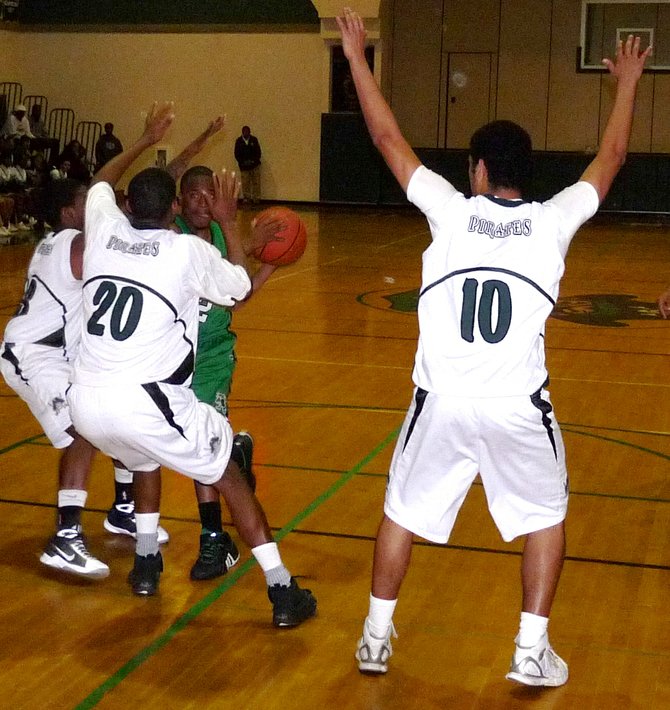 A Lincoln player tries to navigate an Oceanside double team