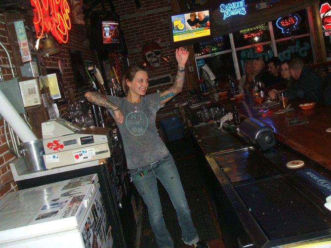 Mel, the bartender, having fun on Metal Mondays at Pier View Pub/Bubs Whiskey Dive 