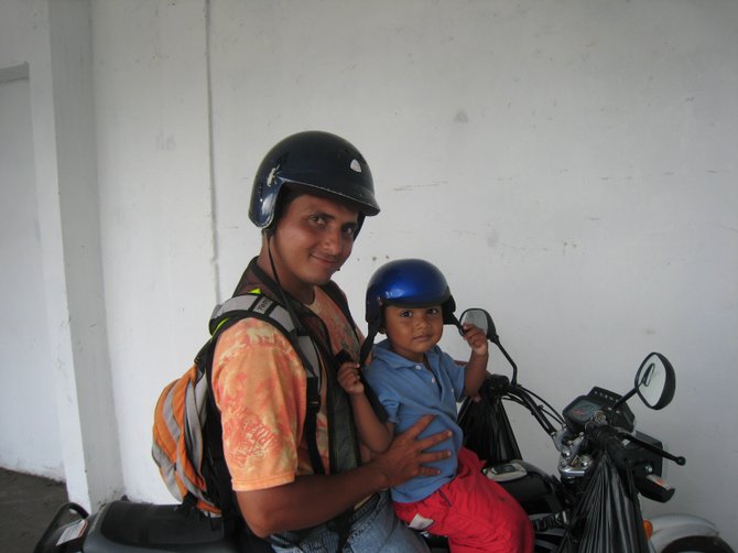 While on the USNS Comfort, I met some of the Navtives of Colombia while on a humanitarian mission in 2007.
Father and Son on Motorcycle in BAHIA MALAGA, COLOMBIA
