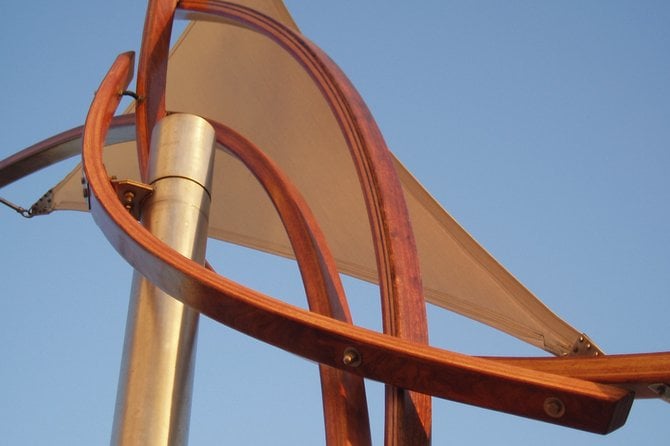 This is an abstract close-up photo of a sculpture called T(H)REE UP by artist Mitchell Gaul that sits near the entrance to the Oceanside Pier.