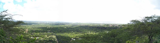 Panoramic shot looking towards the southern end of Bonaire from the hill in the middle of the island.  Very flat southern end of the island. 
