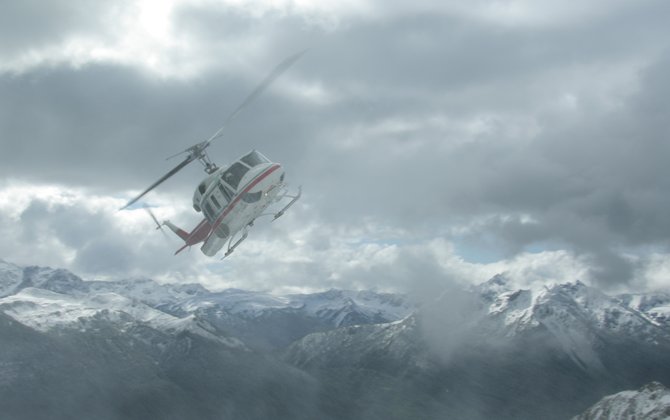 Helicopter ride in snow storm, Canadian Rockies


