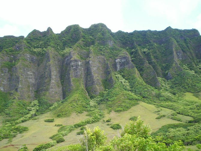 The fluted hillsides of Oahu as seen from Kualoa Ranch. 
There have been many movies filmed at this location including Pearl Harbor and Jurassic Park.  

