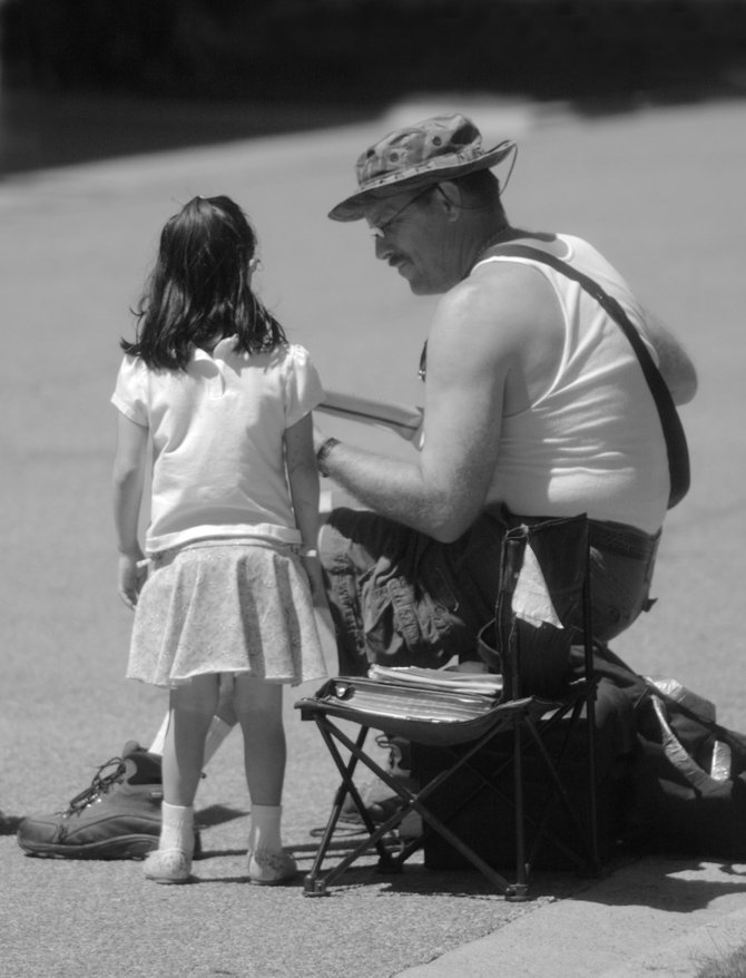 Street performer and young fan.