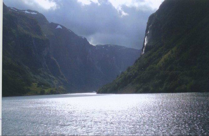 The sun was just breaking through a bank of clouds as I took this picture on a fjord cruise in Norway.
