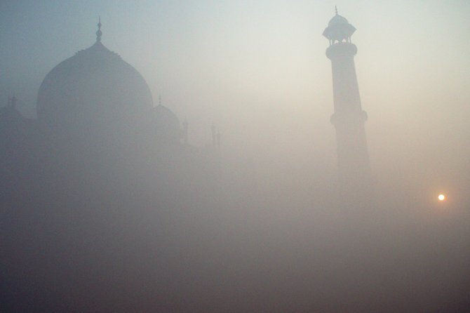 This photo of the Taj Mahal was taken in early morning mist. The sun eventually broke through for a beautiful sunny day.