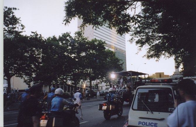 This was taken in 2004 outside the United Nations Building in New York as one of the Olympic torch bearers passed by. 