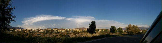 This thundercloud appeared over our East County on the afternoon of Septmeber 5th, 2009.  Took this from the an elementary school in Eastalke facing east.  It reminded me of the cloud that the alien ships flew out of in Independence Day.