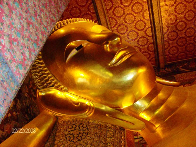Wat Pho Banngkok Thailand is mainly famous for the huge Reclining Buddha statue it houses. At 20 acres large, it is the largest Wat in Bangkok, and is technically the oldest too, as it was built around 200 years before Bangkok became Thailand's capital.The highly impressive gold plated reclining Buddha is 46 meters long and 15 meters high, and is designed to illustrate the passing of the Buddha into nirvana. The feet and the eyes are engraved with mother-of-pearl decoration, and the feet also show the 108 auspicious characteristics of the true Buddha. 