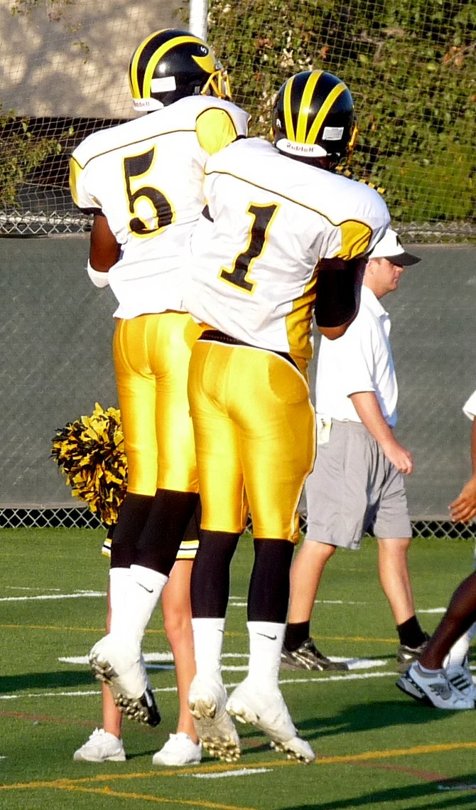 Mission Bay receivers Mahbu Keels (left) and Ray Herring get pumped up for the game