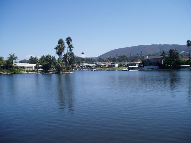 This is why they call San Diego County paradise. This lovely neighborhood is right across the lake from from the beach at the Lake San Marcos Resort. Not a bad place to live. It must be nice to be able to say, "My other car is a canopy covered motorboat."