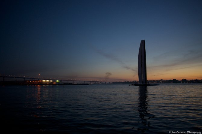 The BMW Oracle Racing Team pulling in during sunset
