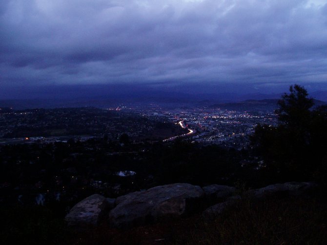 This photo was taken at dusk, facing East from the top of Mt. Helix, two days after Thanksgiving 2009, right after the big rainstorm. 
