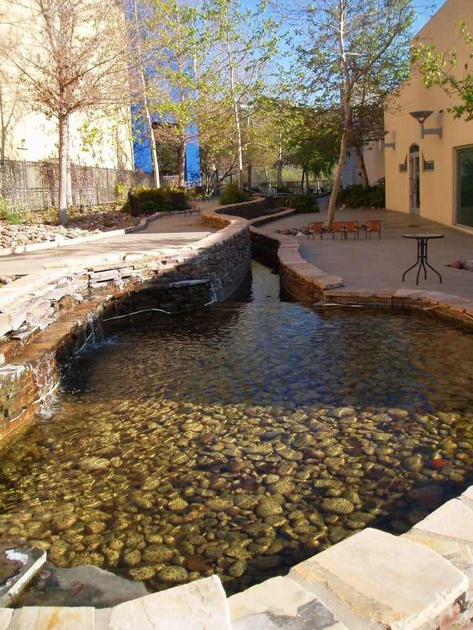 The Mission Valley Library has an outdoor water feature reminiscent of the San Diego River that runs nearby. 
