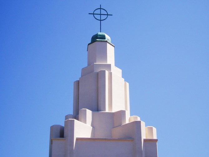 The spire on St. Mary Magdalene Catholic Church in Bay Park is a fine example of art deco architecture.
