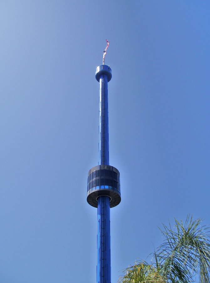 The SeaWorld Skytower, which recently celebrated its 40th anniversary, opened on October 21st 1969 and was originally sponsored by PSA (Pacific Southwest Airlines). According to SeaWorld's website, the tower is 320 feet tall and uses 5 miles of wire and 1,944 light bulbs to create its annual holiday "tree of lights" display.  
