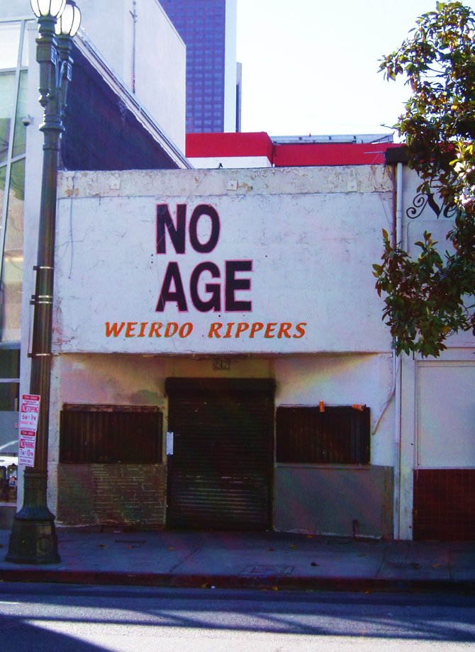 I spotted this amusing, confusing sign on the side of a decrepit building in downtown Los Angeles. A little google search revealed that Weirdo Rippers is the name of a band. 