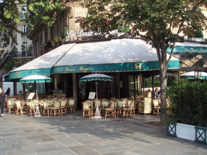 This is the legendary Les Deux Magots, a cafe in Paris that was frequented by Picasso, Hemingway, Fitzgerald, Sartre, Camus, Oscar Wilde and other famous writers, philosophers and artists. 
