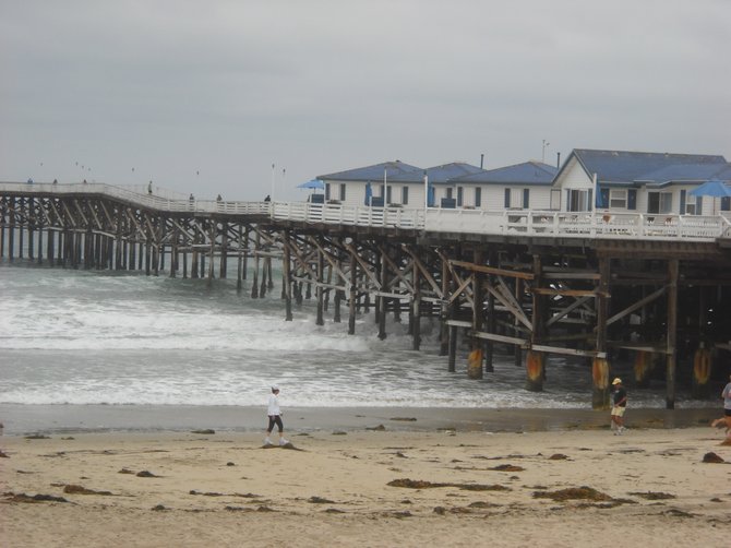 The day may be gloomy but the cottages on Crystal Pier never lack charm! 