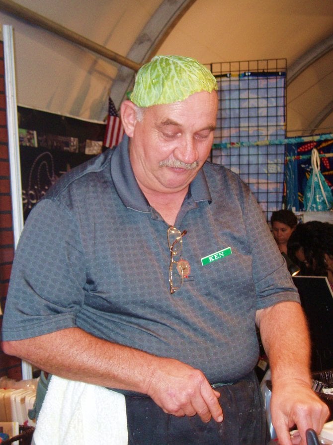 This fellow with the cabbage hat was demonstrating a vegetable chopping device at the San Diego County Fair. 
