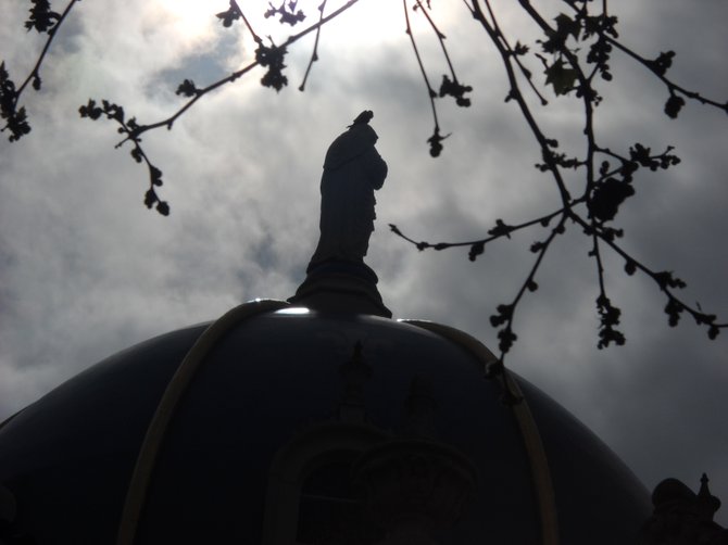 A crow adorns the Church cupola on the USD campus on Easter Sunday! (Not sacrilege.)

