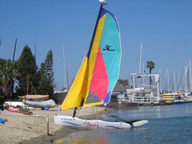 Colorful sailboats await a stiff breeze along San Diego Bay.