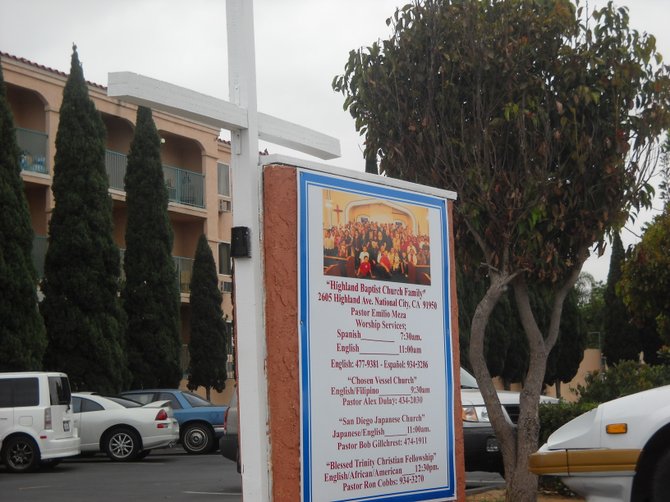 Love how the cross is co-mingled with the Church sign-very inventive.