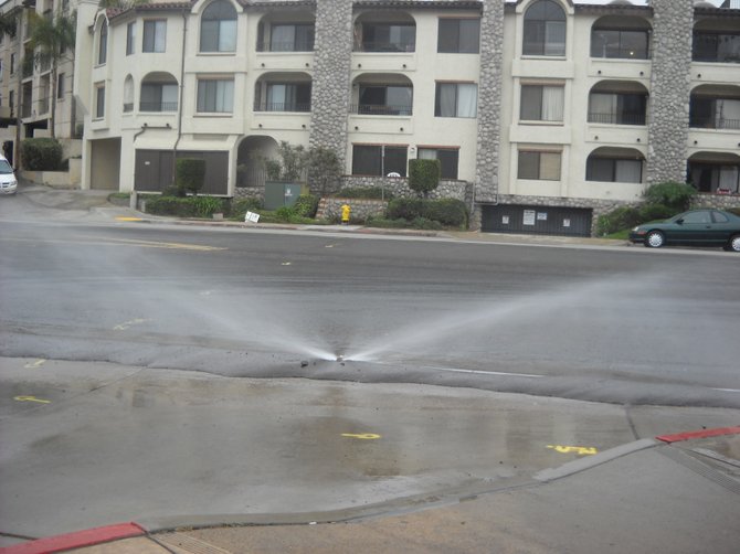 Street Sprinkler along West Pt. Loma Blvd.was a broken temporary pipe in 4400 block driveway.