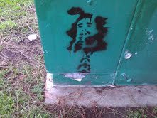 A spray paint stencil in loving memory of the late, great
Kenny Diaz. lead singer of the Riverbottom rockers
