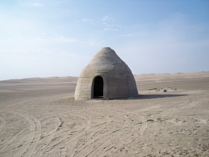 Adobe hut near the sand dunes of Pisco.
