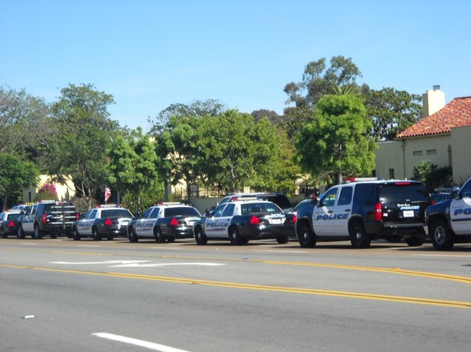 Police motorcade along Rosecrans for slain SDPD officer Chris Wilson.