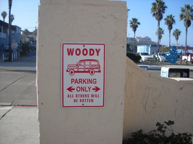 Park your woody sign at the OB Hotel parking lot.