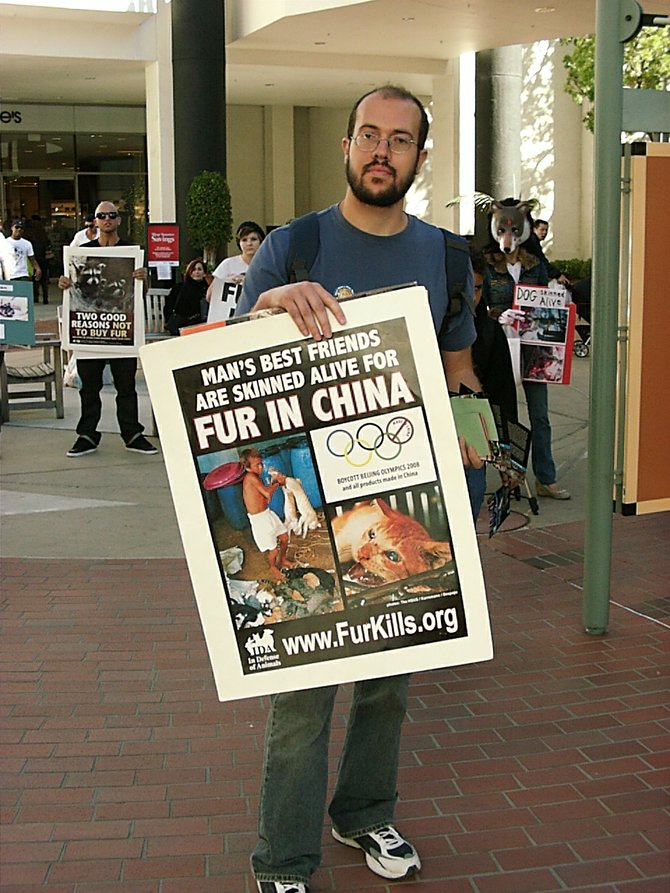 These activists protested fur outside of Bloomingdales at the Fashion Valley Mall on "Fur Free Friday," November 26, 2010.
