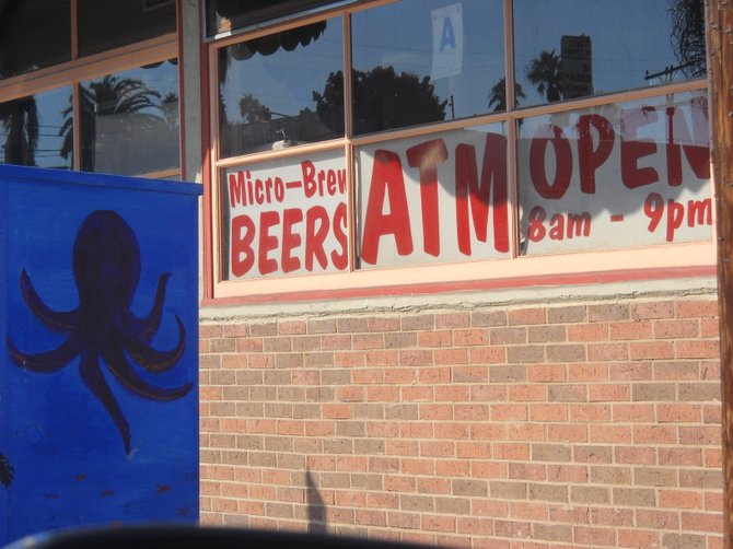 Near Olive Tree Market, an octopus looks thirsty.
