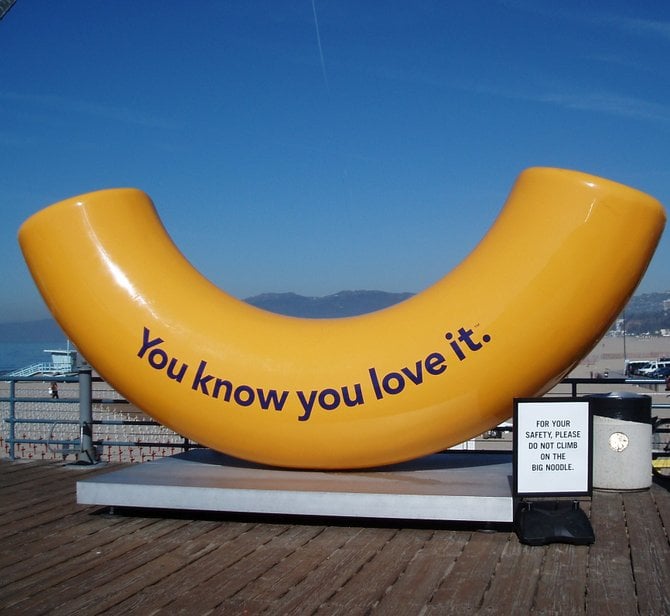 This giant fiberglass macaroni and cheese noodle sits on the pier near the carousel at the Santa Monica Pier. The little sign next to it, stating not to climb on the noodle, is kind of like asking a kid not to EAT macaroni and cheese!