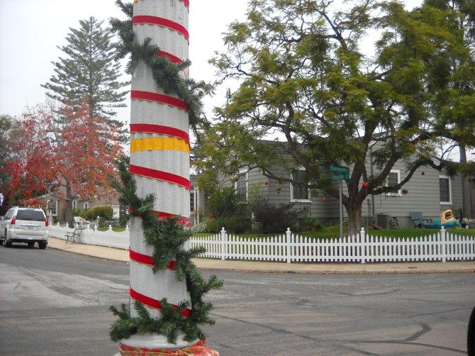 Festive- Decorated poles along Point Loma Street.