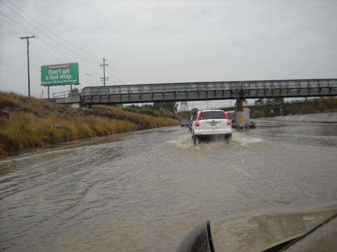 Friars Road near Western Division Police Station flooded during great rain deluge.