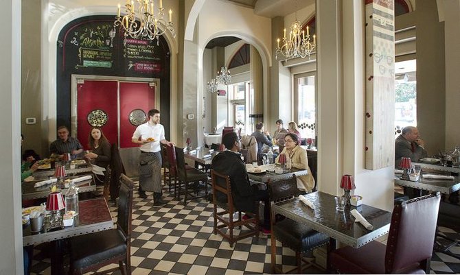 Currant's dining room is a mashup of brasserie, chic bistro, and fancier restaurant.