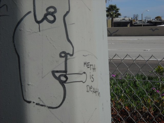 Along Mission Valley bike path-Drug abuse warning.
