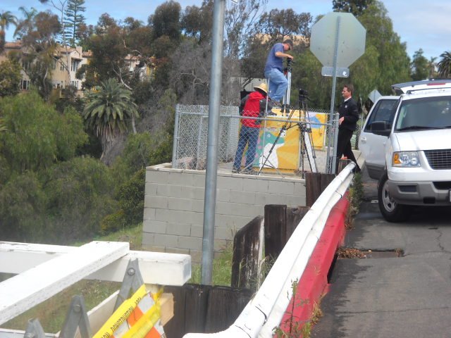 News cameras clamoring for a picture of the Quince Street bridge damaged by a large falling eucalyptus tree on Sunday, March 20th.