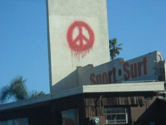 Bleeding peace sign along West Pt. Loma Blvd.