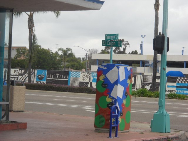 Colorful corner utility box art in City Heights.
