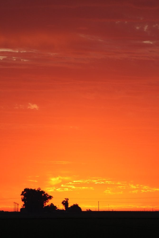 Sunset in Holtville, CA. located in the Imperial Valley. That "snail" looking creature on the lower portion of the photo, reminds me of the Disneyland Light Parade.
"it's a Vilma!"  Vilma Ruiz Pacrem